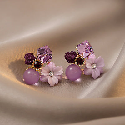 Aretes de Tuerca Flor de Cristal Púrpura en Oro